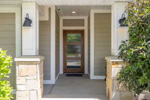 Entrance to property with covered porch