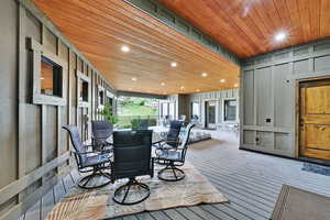 Wooden terrace with outdoor dining space