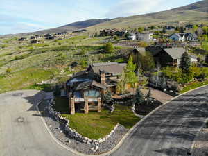 Aerial perspective of suburban area with a mountainous background. Looking North.