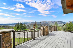 Wooden deck featuring a mountain view