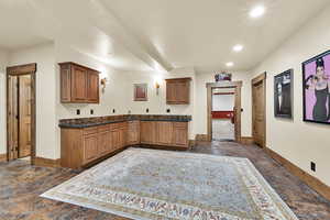 Kitchen featuring wood finish cabinets