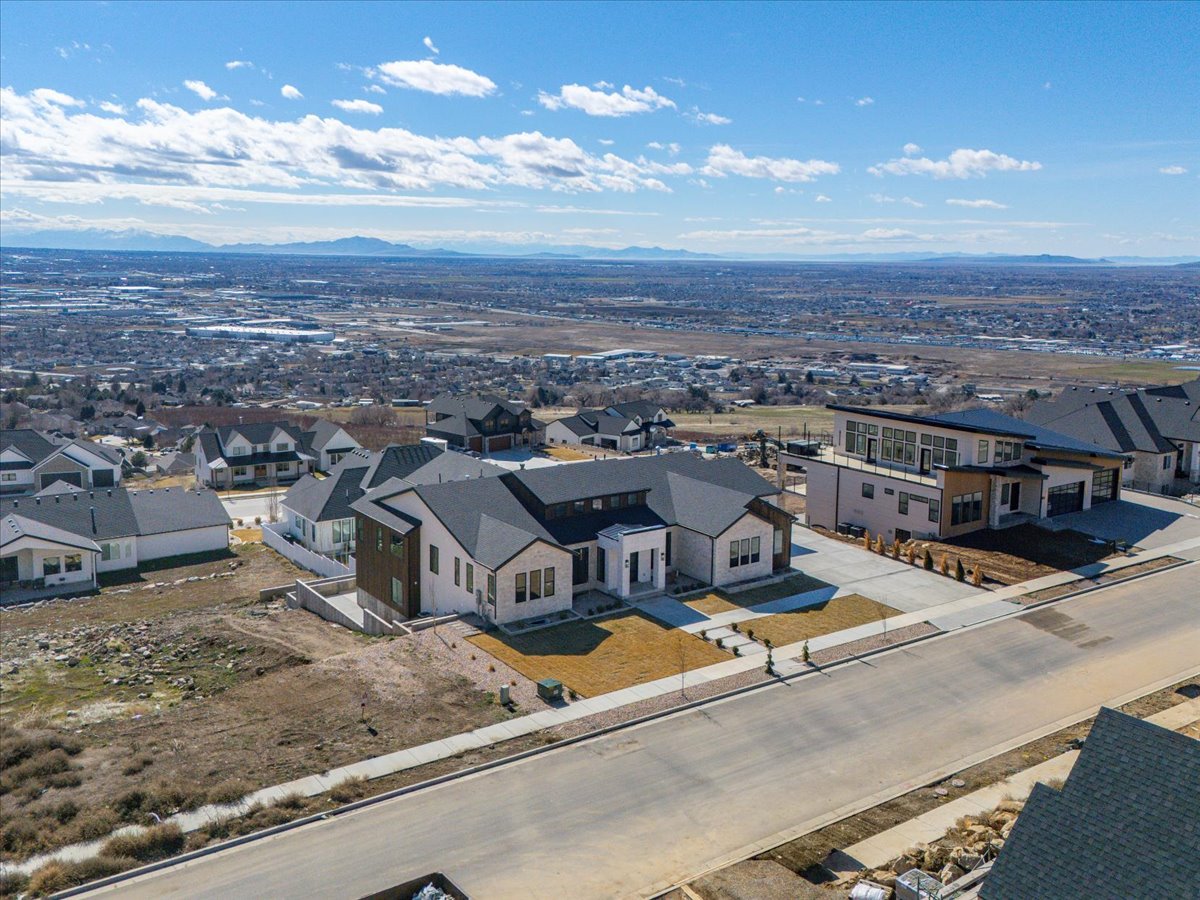 Aerial perspective of suburban area featuring mountains
