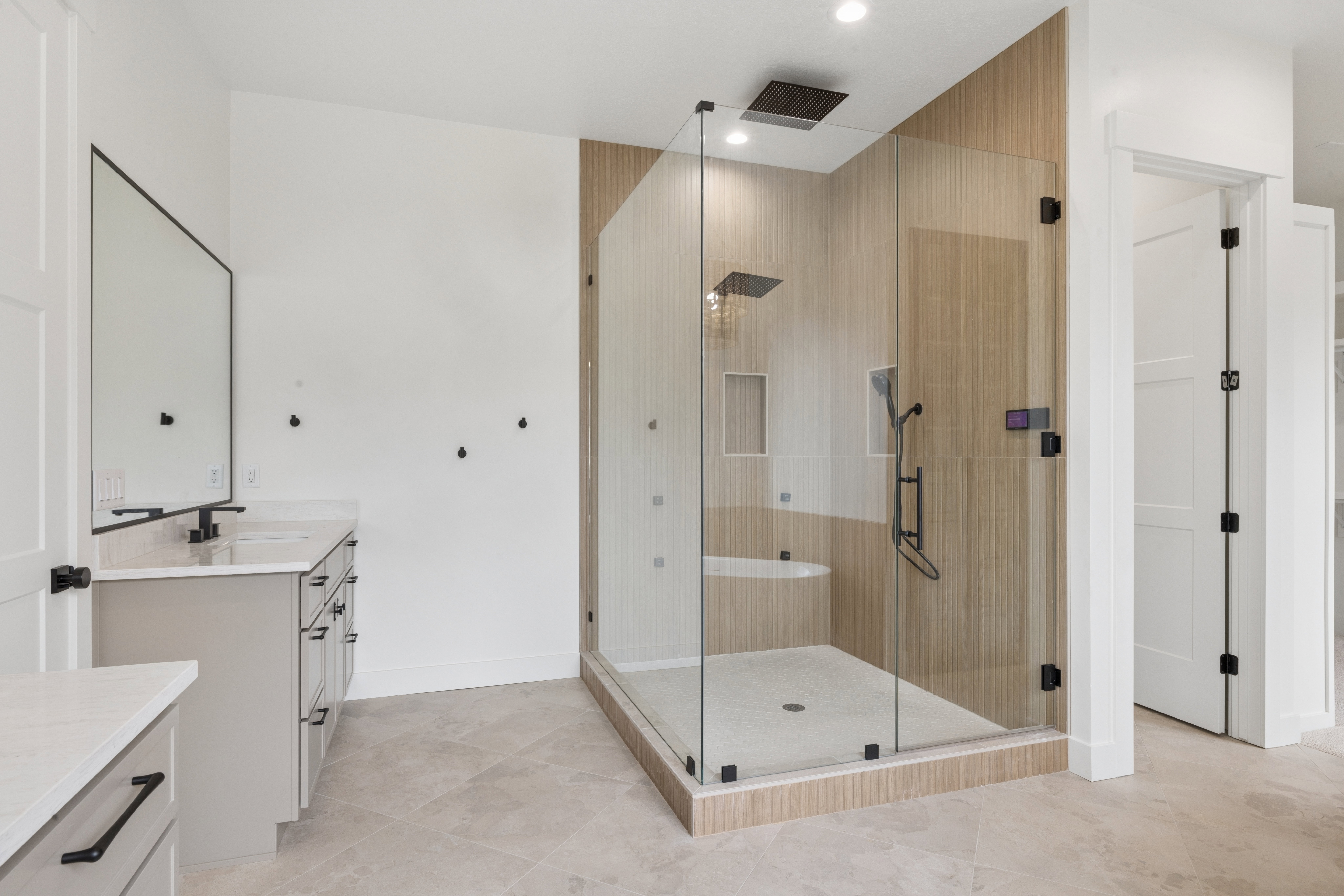 Full bath with vanity, a stall shower, and recessed lighting
