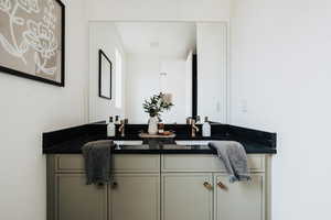 Bathroom featuring double vanity