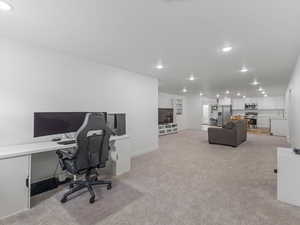 Basement great room and office/flex area.