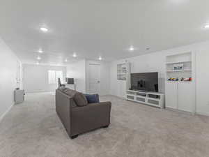 Basement great room and office/flex area.