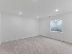 Basement secondary bedroom.