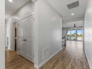 Entry hall with view through living room.