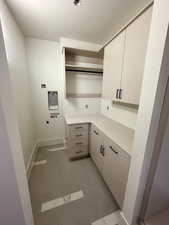 Laundry in primary bedroom closet