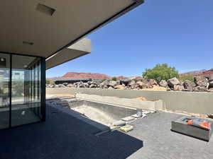 View of patio / terrace featuring a mountain view