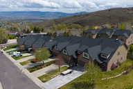 Aerial view of residential area featuring mountains