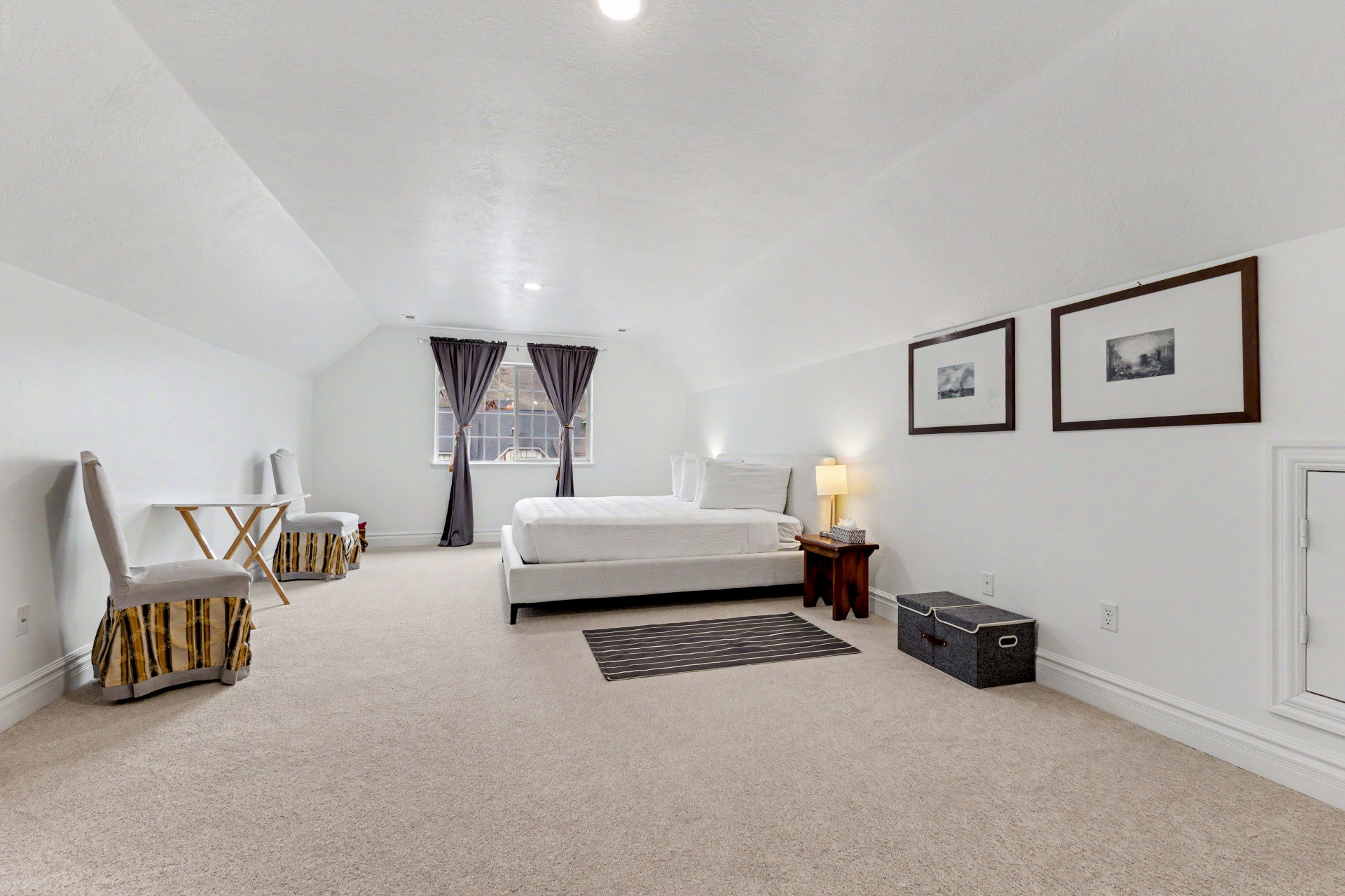 Bedroom with light carpet and recessed lighting
