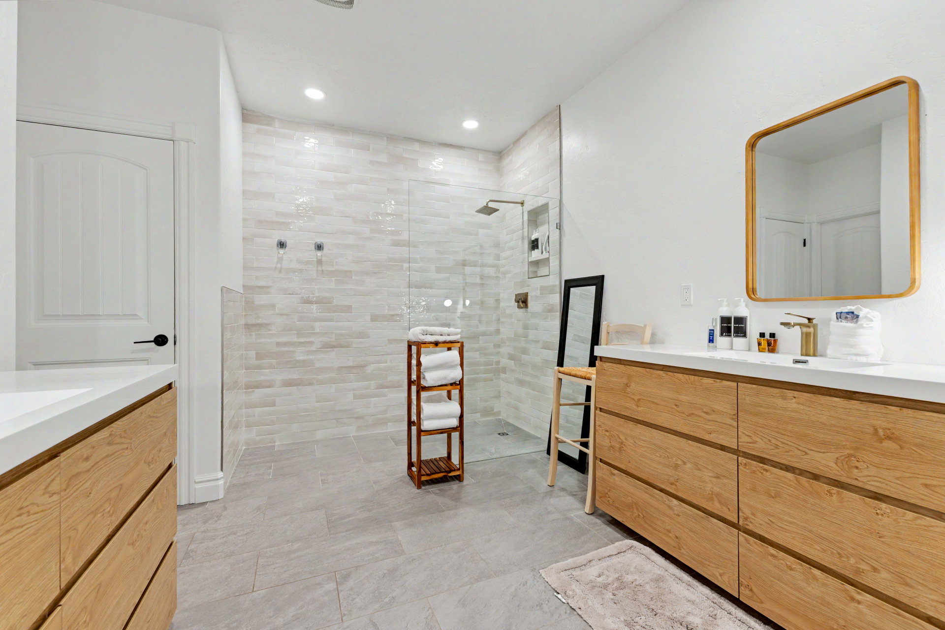 Full bathroom with vanity, a walk in shower, and recessed lighting