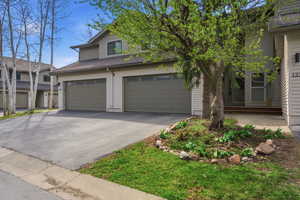 Traditional-style house featuring driveway