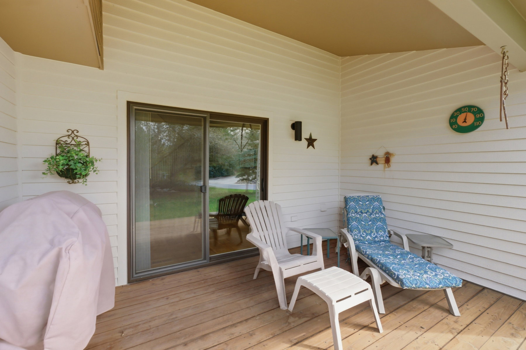 Wooden terrace with a grill