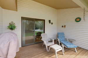 Wooden terrace with a grill