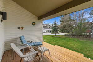 Deck featuring a yard