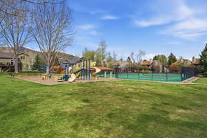 Community jungle gym featuring a residential view