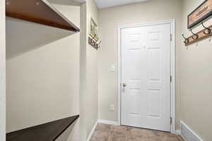 Entryway featuring baseboards