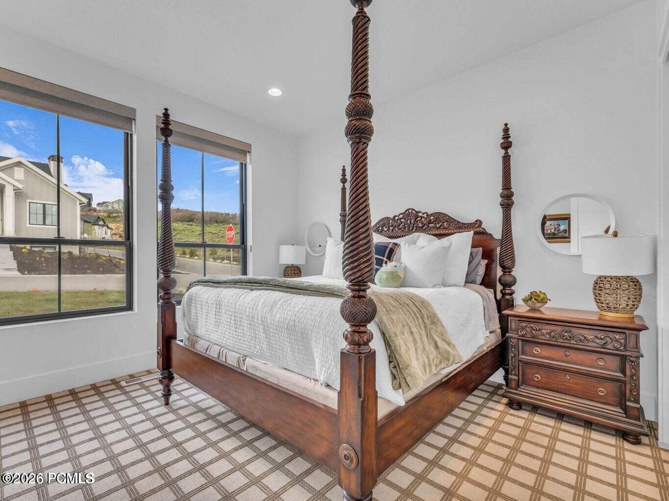 Bedroom featuring baseboards and recessed lighting