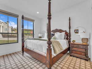 Bedroom featuring baseboards and recessed lighting