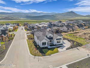 Aerial view of residential area with mountains