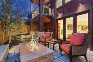 Patio / terrace with an outdoor fire pit and a patio