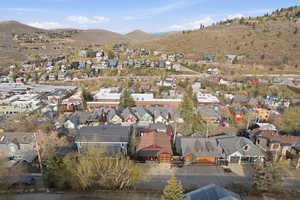 Aerial view of residential area with mountains