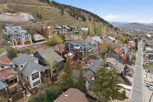 Aerial view of residential area featuring a mountain backdrop