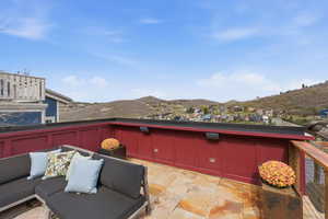 View of patio with a mountain view