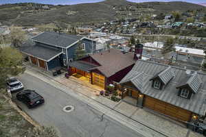 Aerial view of residential area featuring mountains