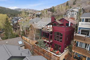 Aerial view of residential area featuring mountains