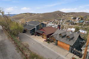 Aerial view of residential area with a mountainous background