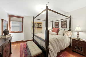 Bedroom featuring dark wood finished floors
