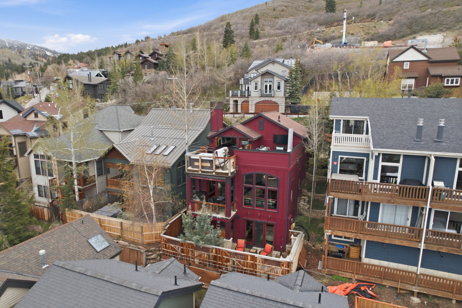 Aerial view of residential area featuring mountains
