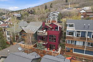 Aerial view of residential area featuring mountains