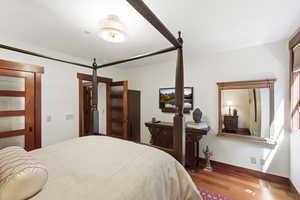 Bedroom featuring wood finished floors