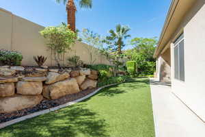 View of fenced backyard