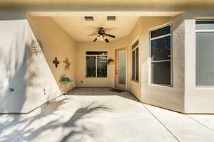 View of patio with ceiling fan