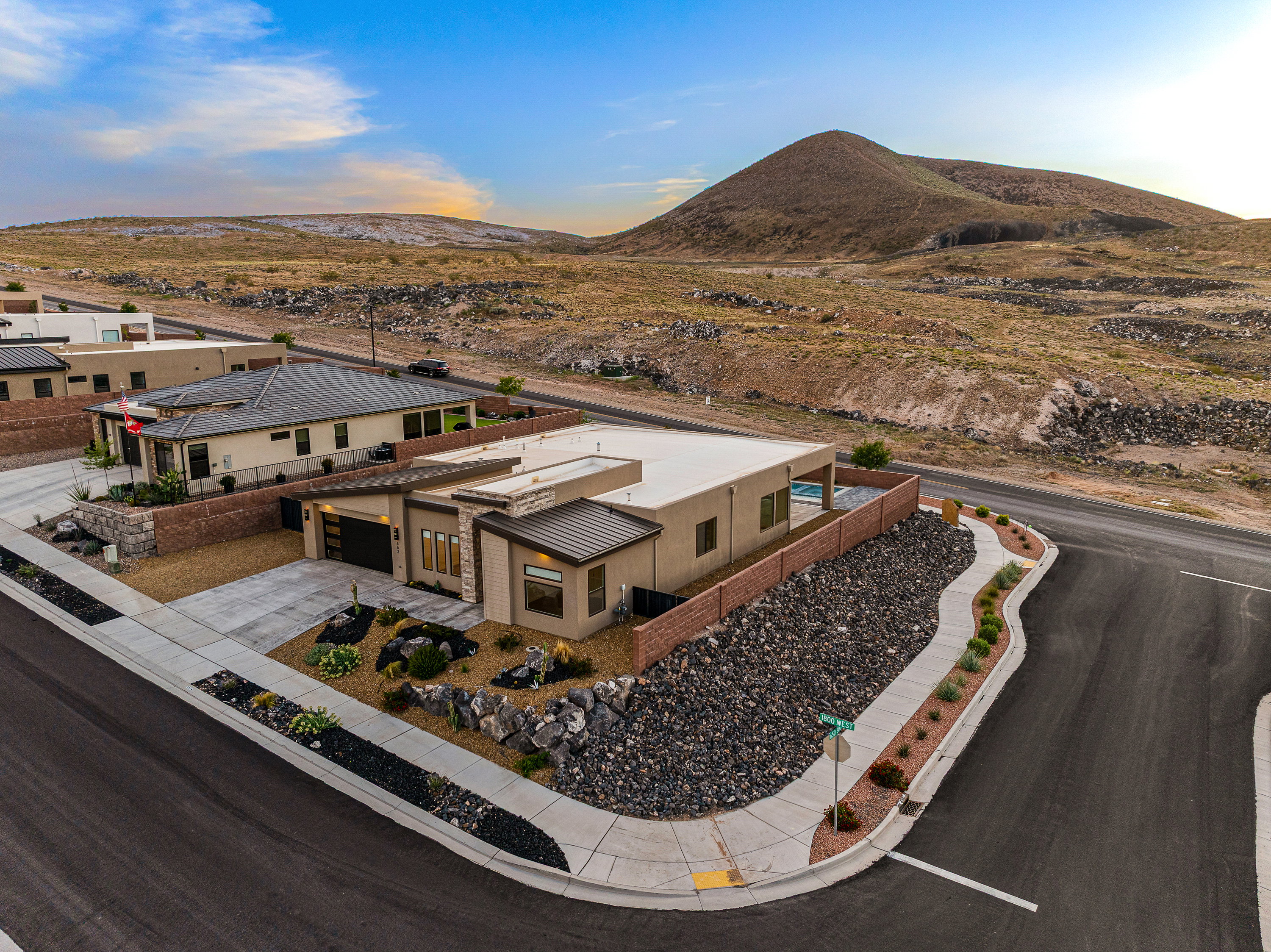 View of subject property featuring mountains