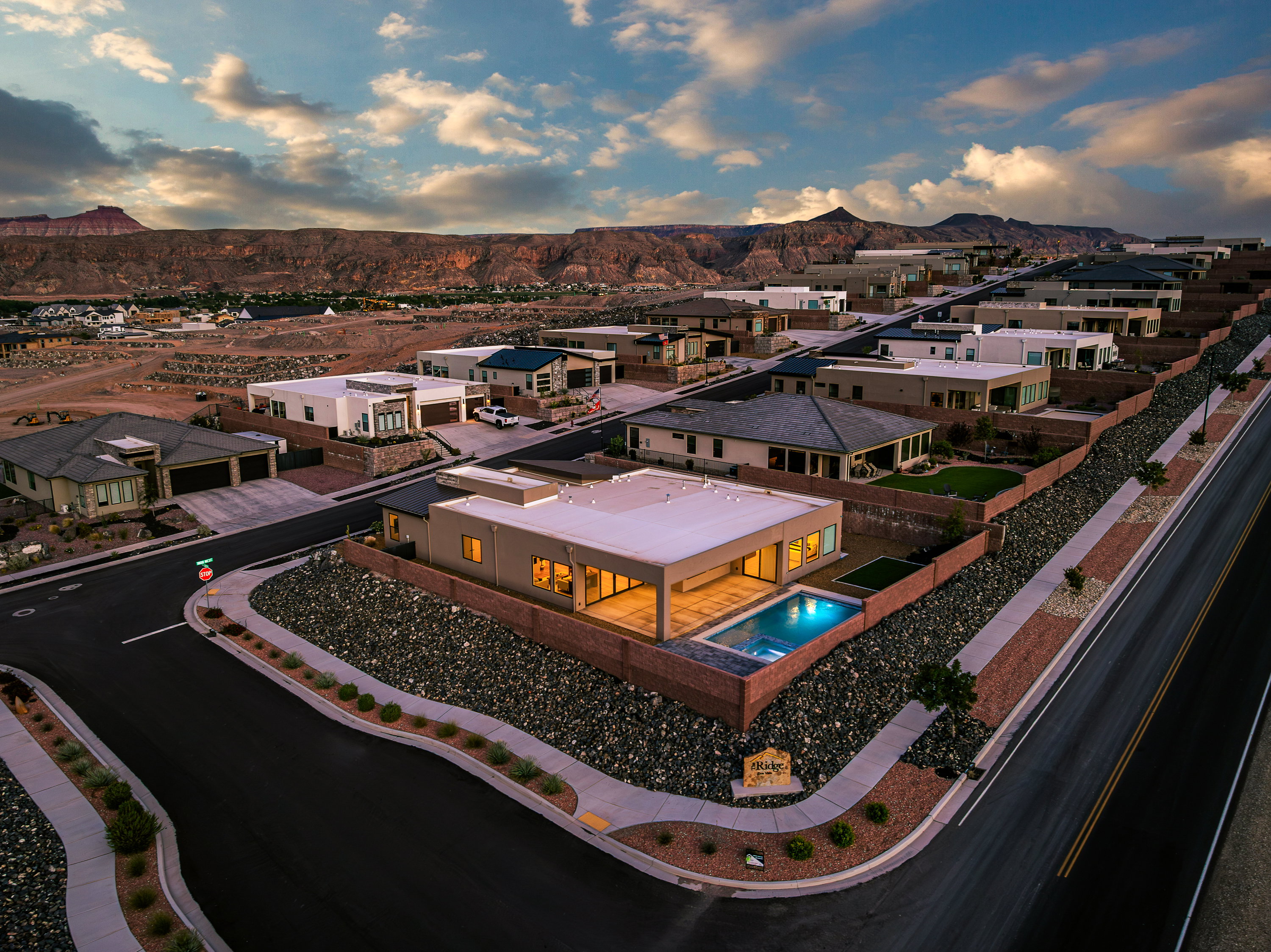 Aerial view of residential area with a mountainous background