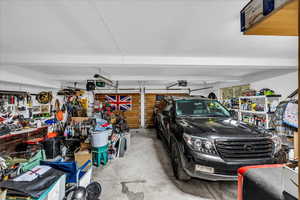 Garage featuring a workshop area