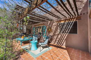 View of patio featuring a pergola