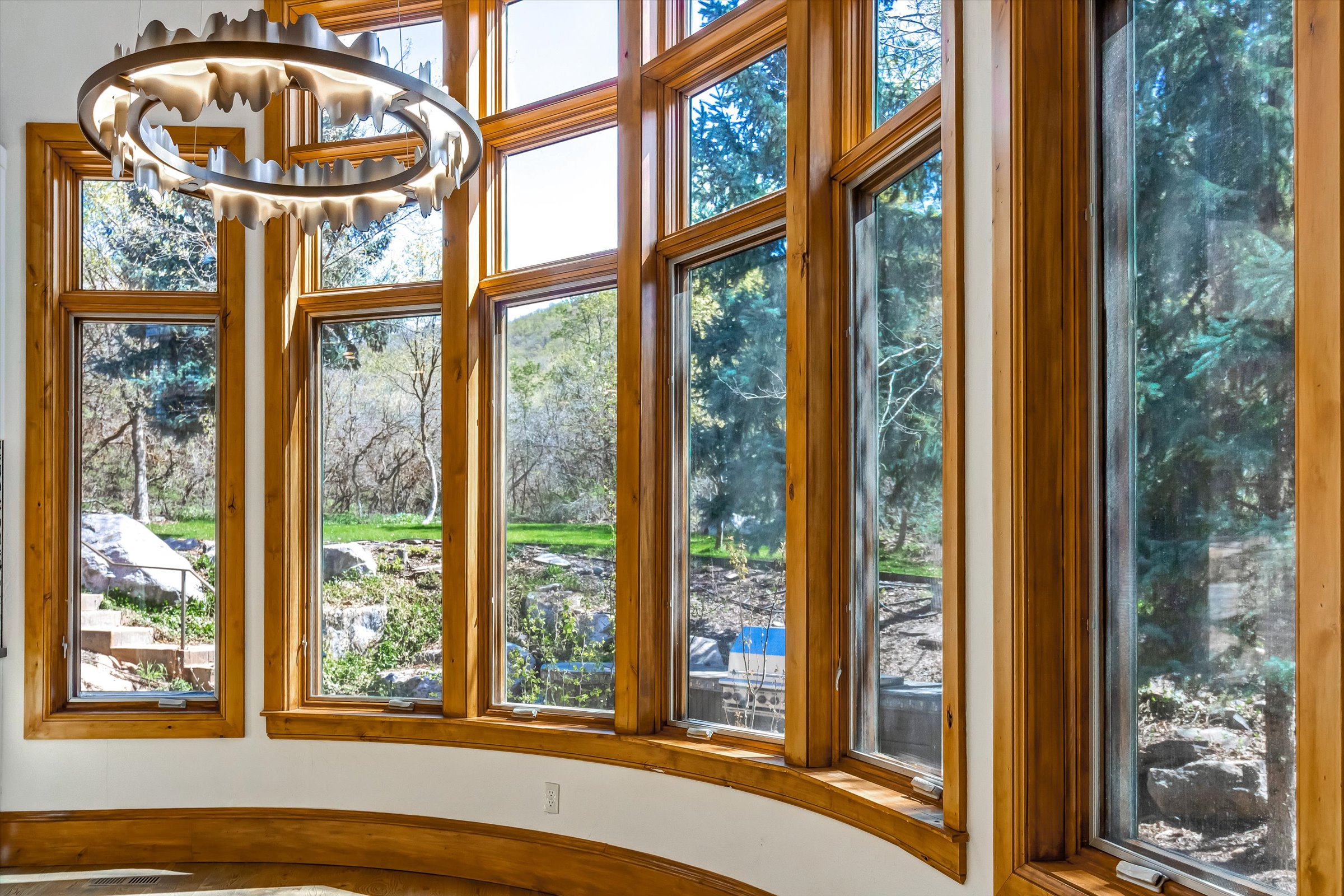 Beautiful millwork surrounds sunny windows with gorgeous views.