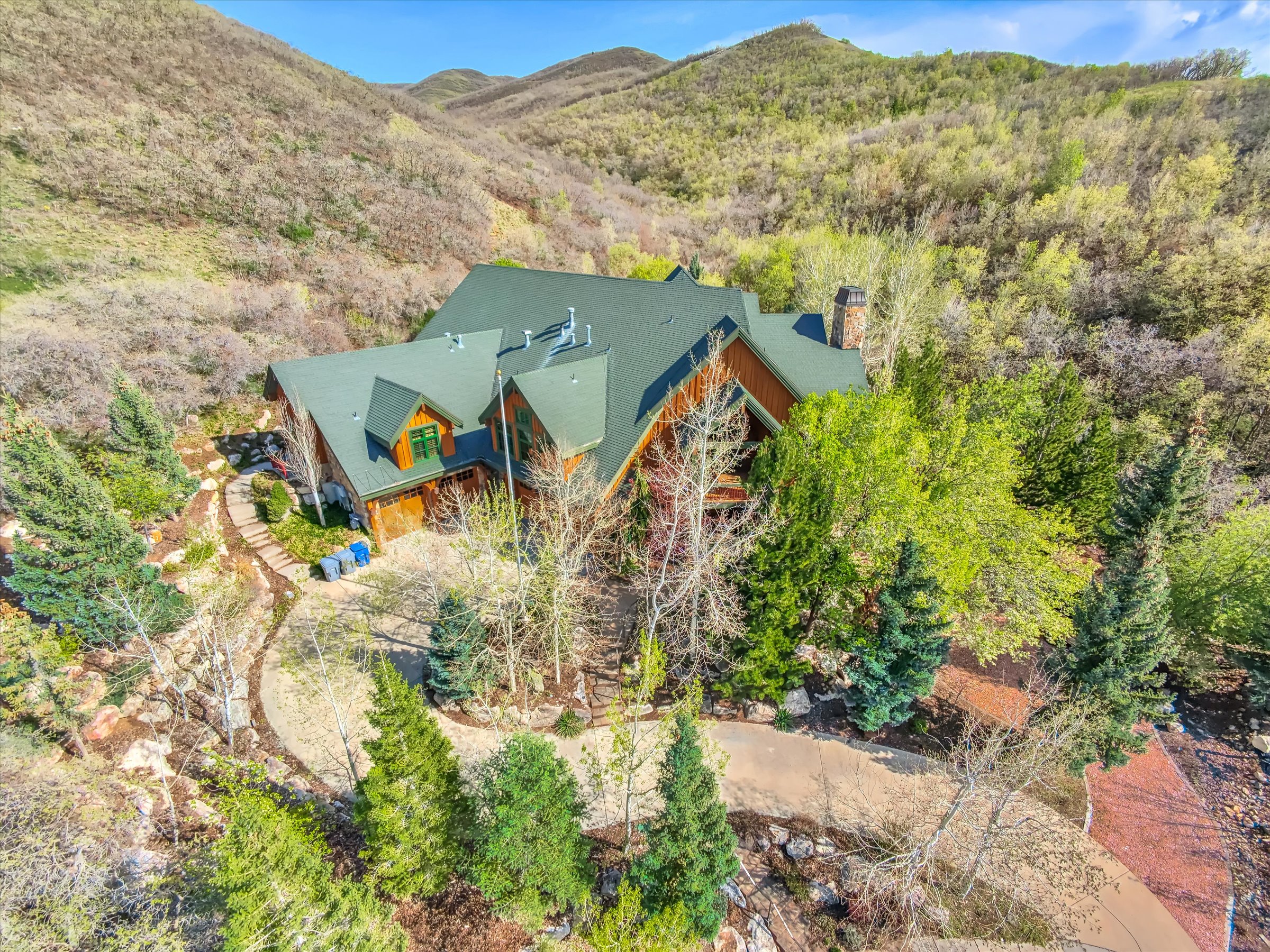 Mature trees and National Forest offer quiet seclusion, though minutes from downtown.