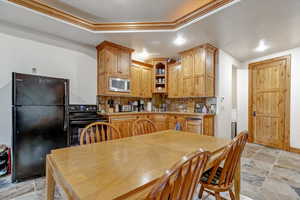Dining room featuring stone tile floors