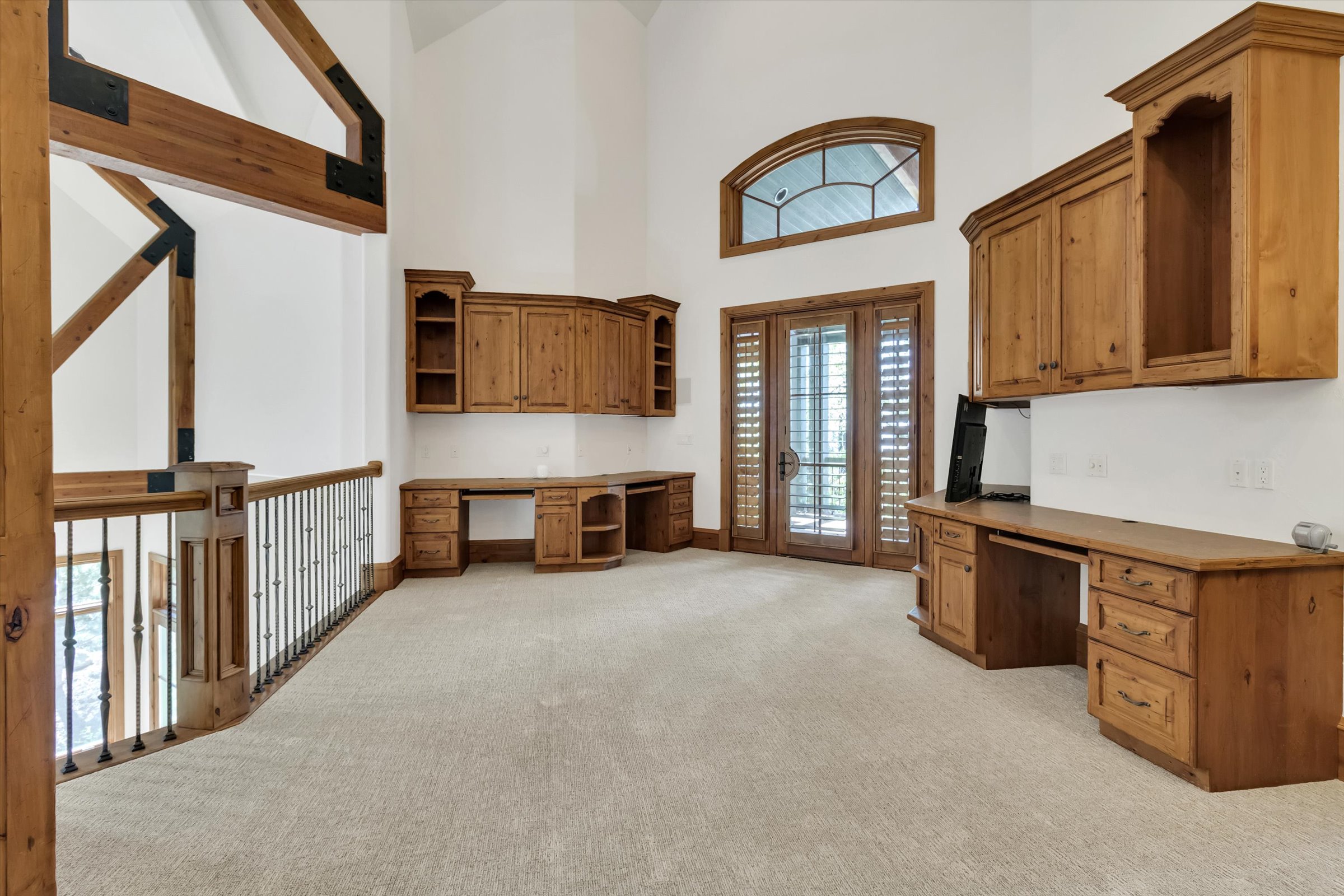 Loft with lots of room for studying and access to a private covered deck.