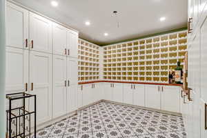 Kitchen with white cabinets and recessed lighting