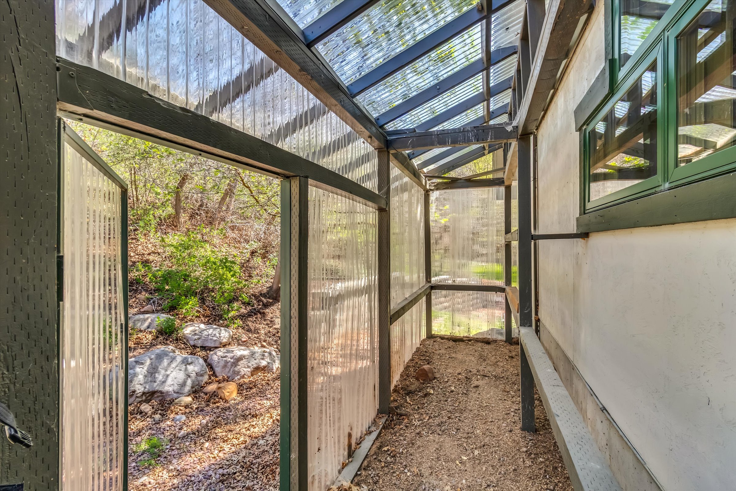 Attached greenhouse.