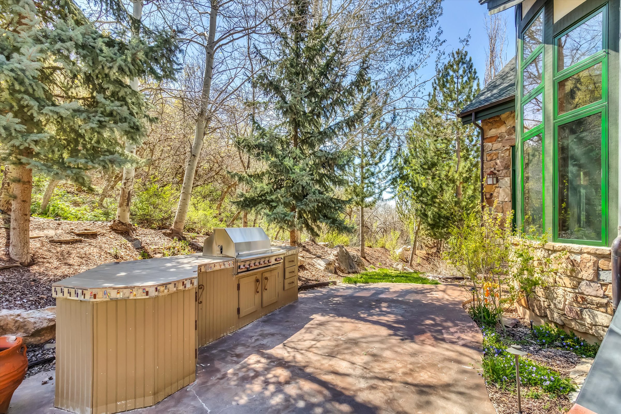 Built-in outdoor grill steps away from the kitchen.
